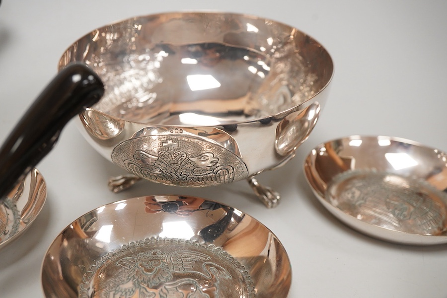 A small collection of mainly Malaysian white metal items including four hardwood handled servers, an 800 standard bowl, flower spreader and three small dishes.